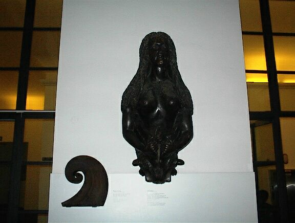 A statue hanging from the wall as we exited the museum